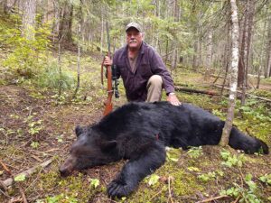 Black Bear and Hunter
