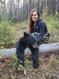 Female Hunter with her Black Bear