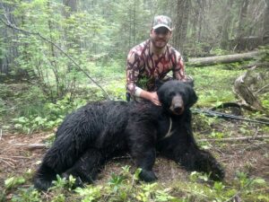 Idaho Black Bear with happy hunter