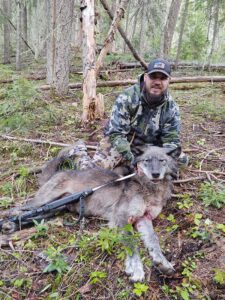 Hunter with his Canadian Grey Wolf