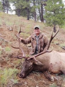 Hunter with his Humongous Elk