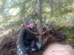 Youth hunter with a big Rocky Mountain Elk